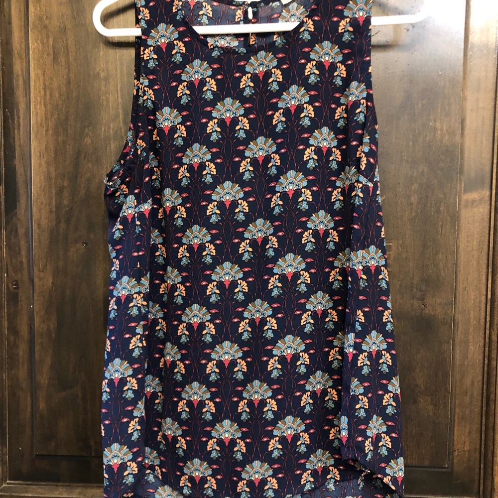 Daniel Rainn blue patterned sleeveless blouse.